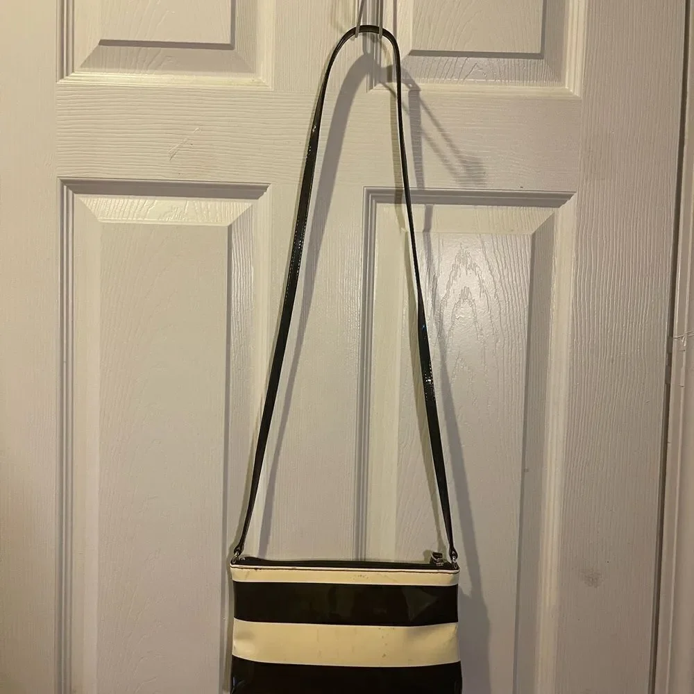 Kate Spade patent Black and Cream Striped small Crossbody Bag.